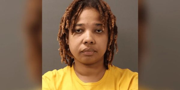 A high school teacher offered teenager $2,000 to kill her husband, authorities allege