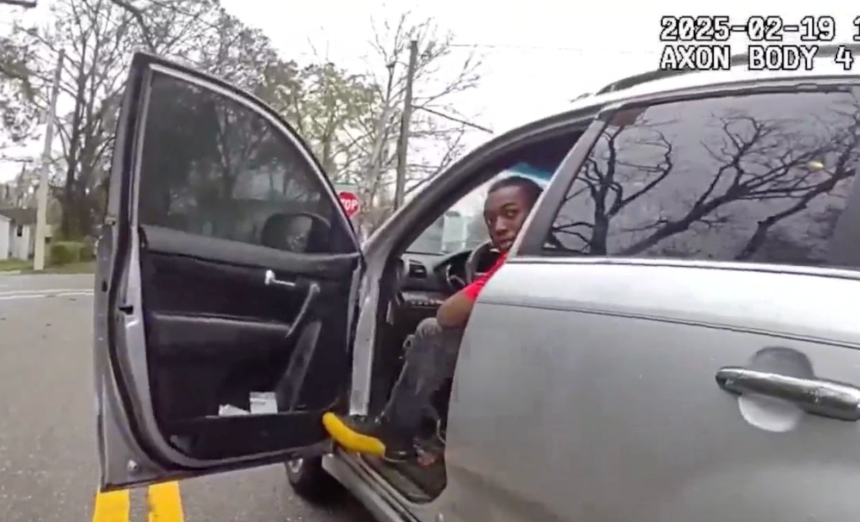 Jacksonville Sheriff's Office body camera footage shows Officer D. Bowers speaking with William McNeil after he opened his car door