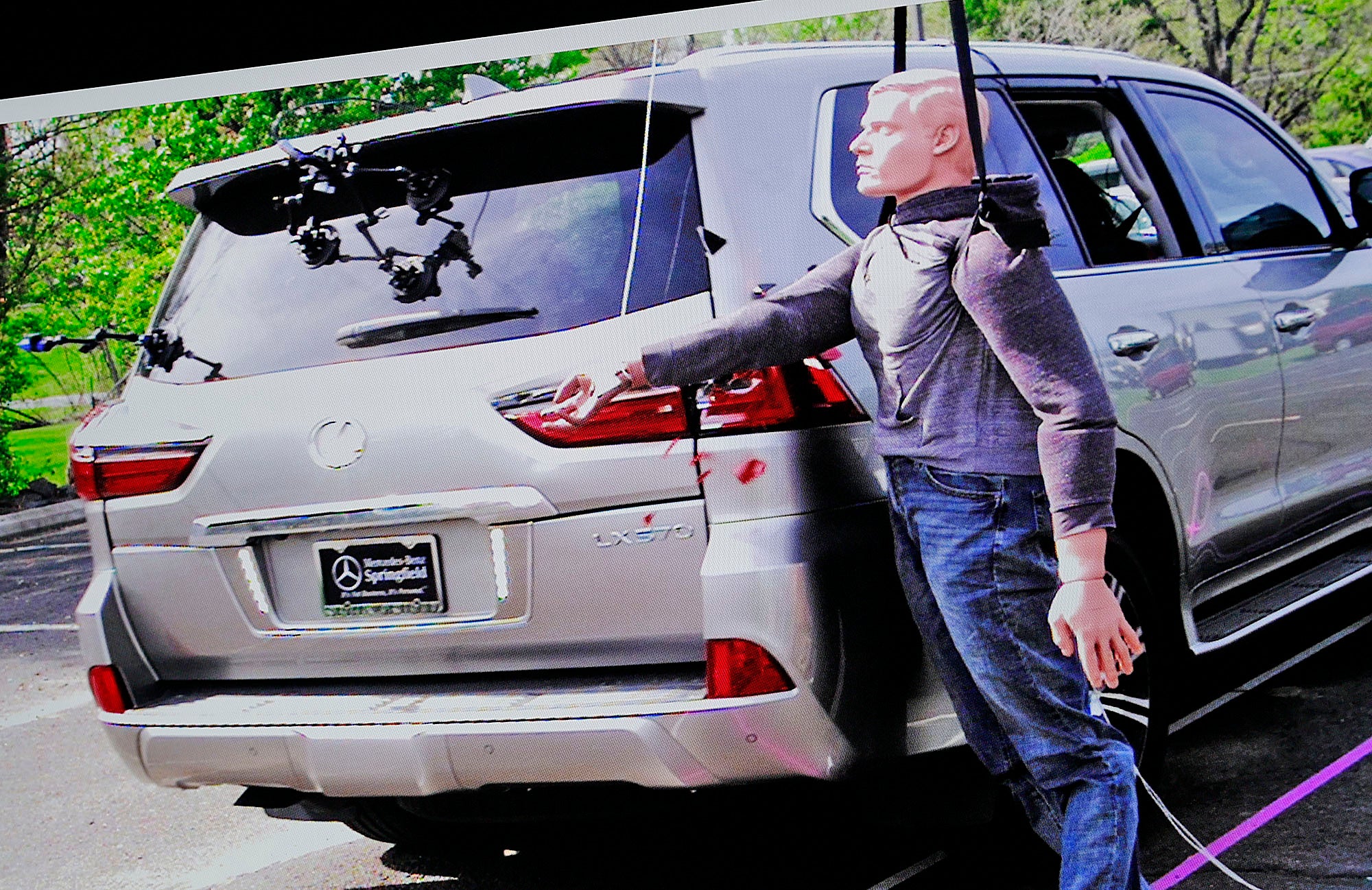 Still images from an ARCCA reconstruction test show the shattering of an SUV taillight during the Karen Read retrial in Norfolk Superior Court