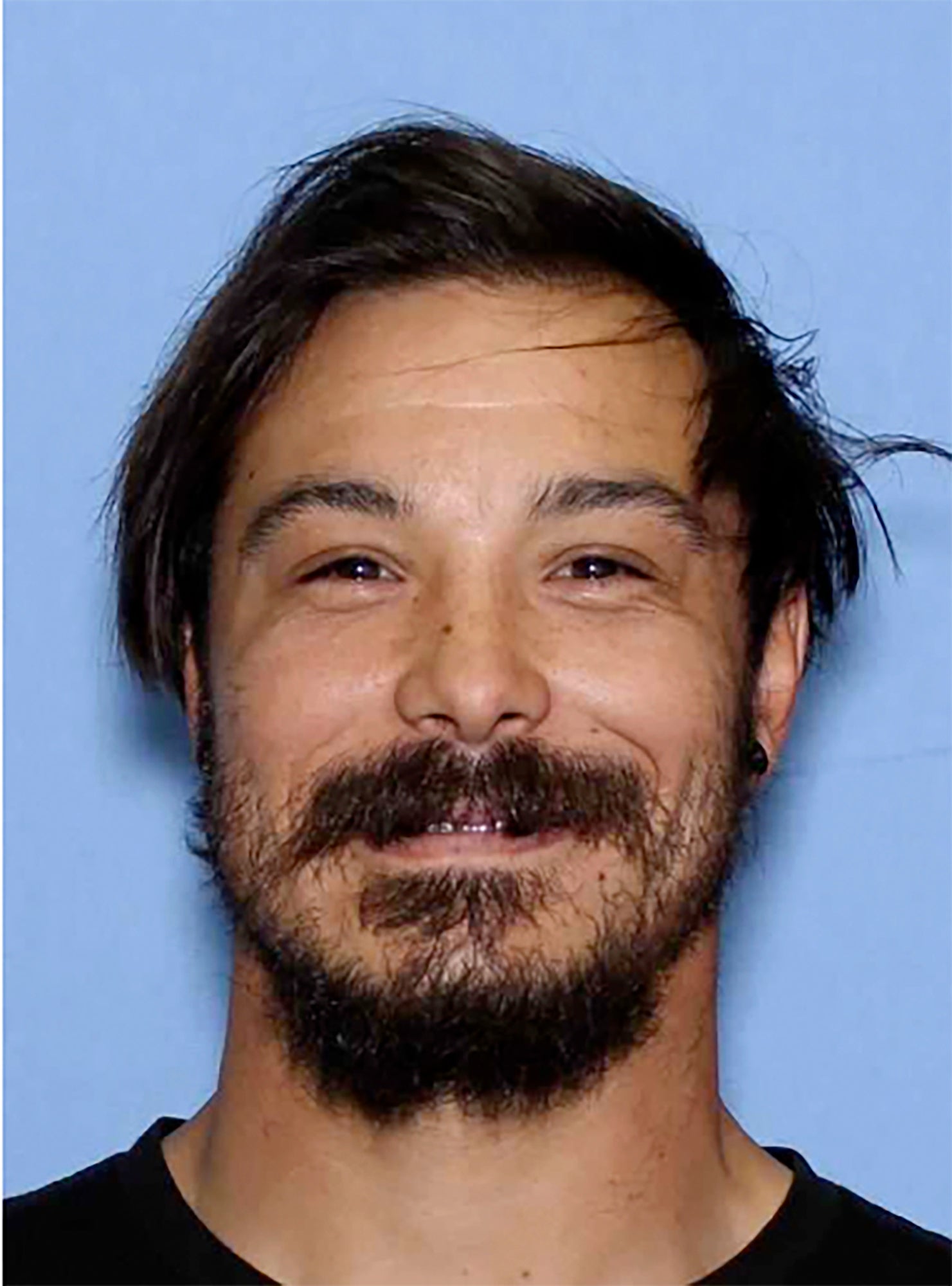 Police are searching for Travis Decker, whose DNA profile was linked to the scene where his three daughters were found dead last month