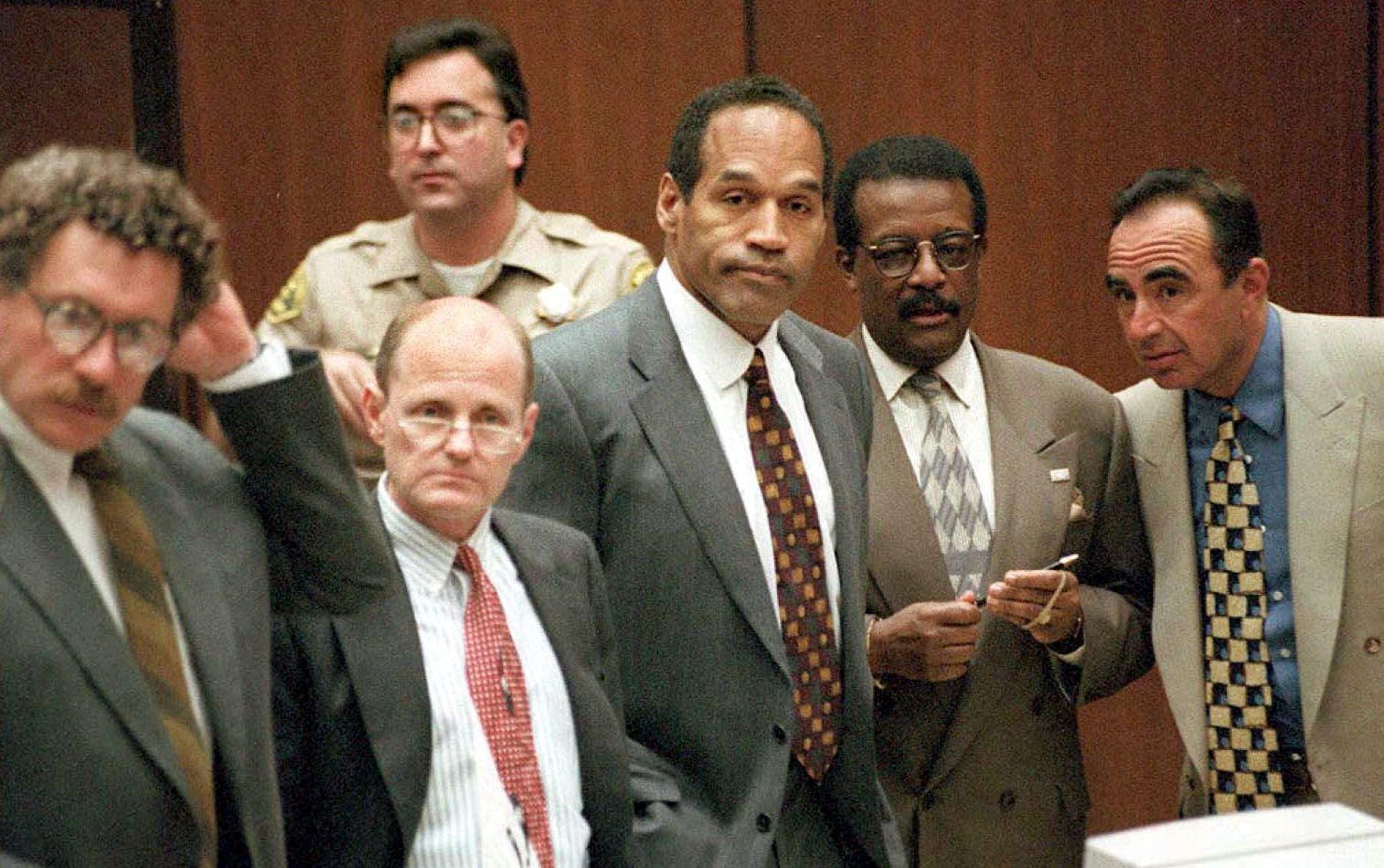 OJ Simpson’s attorneys have praised Sean ‘Diddy’ Combs’s defense team in how they handled the case. Alan Dershowitz, pictured second left, said keeping the rapper off the stand was the ‘smart decision.’