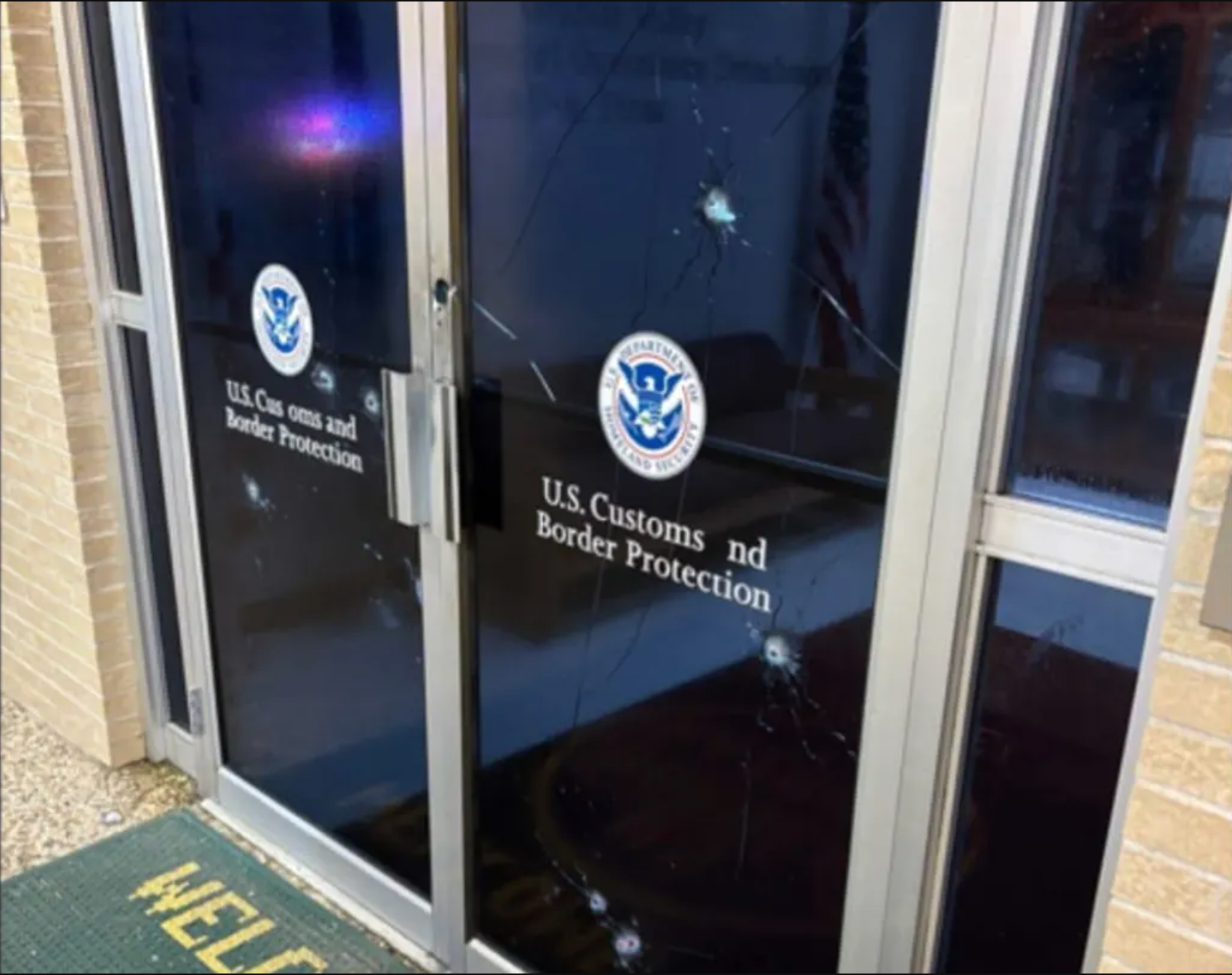 A door at a U.S. Customs and Border Protection office in McAllen, Texas, after it was hit with gunfire on Monday morning.