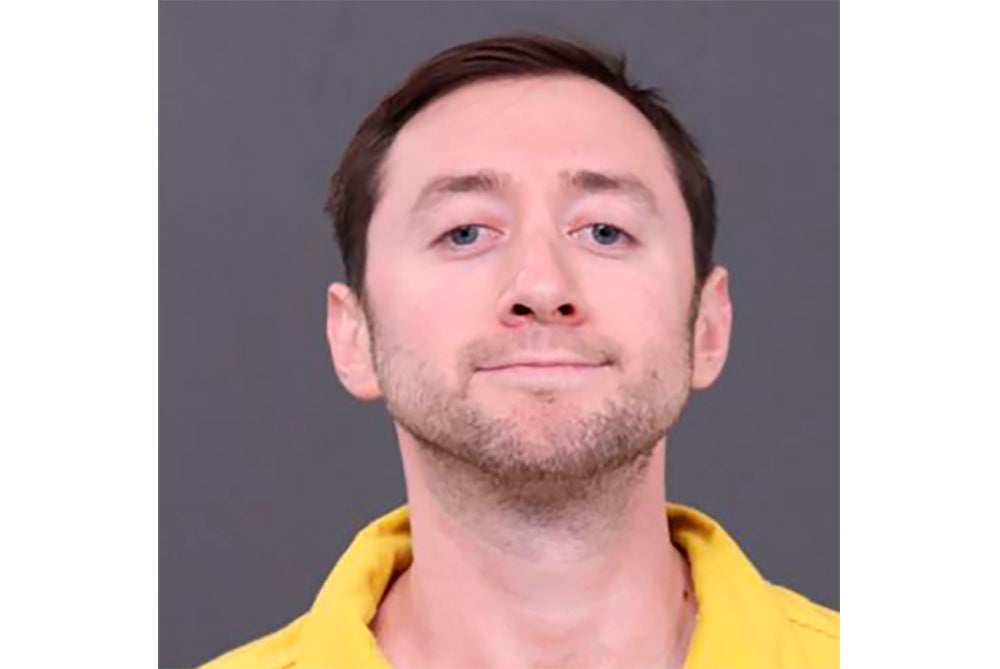 Justin D Mohn, 33, testified and stood for cross examination during the third day of his trial on July 9, 2025. Justin Mohn is accused of fatally shooting and then beheading his father, Michael F Mohn, on January 30, 2024