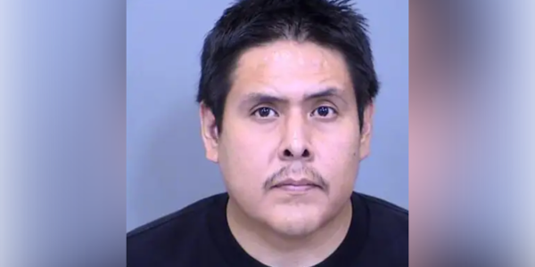 Dad left four little kids in car as temperature soared to 125 while he spent hour in adult entertainment shop: police