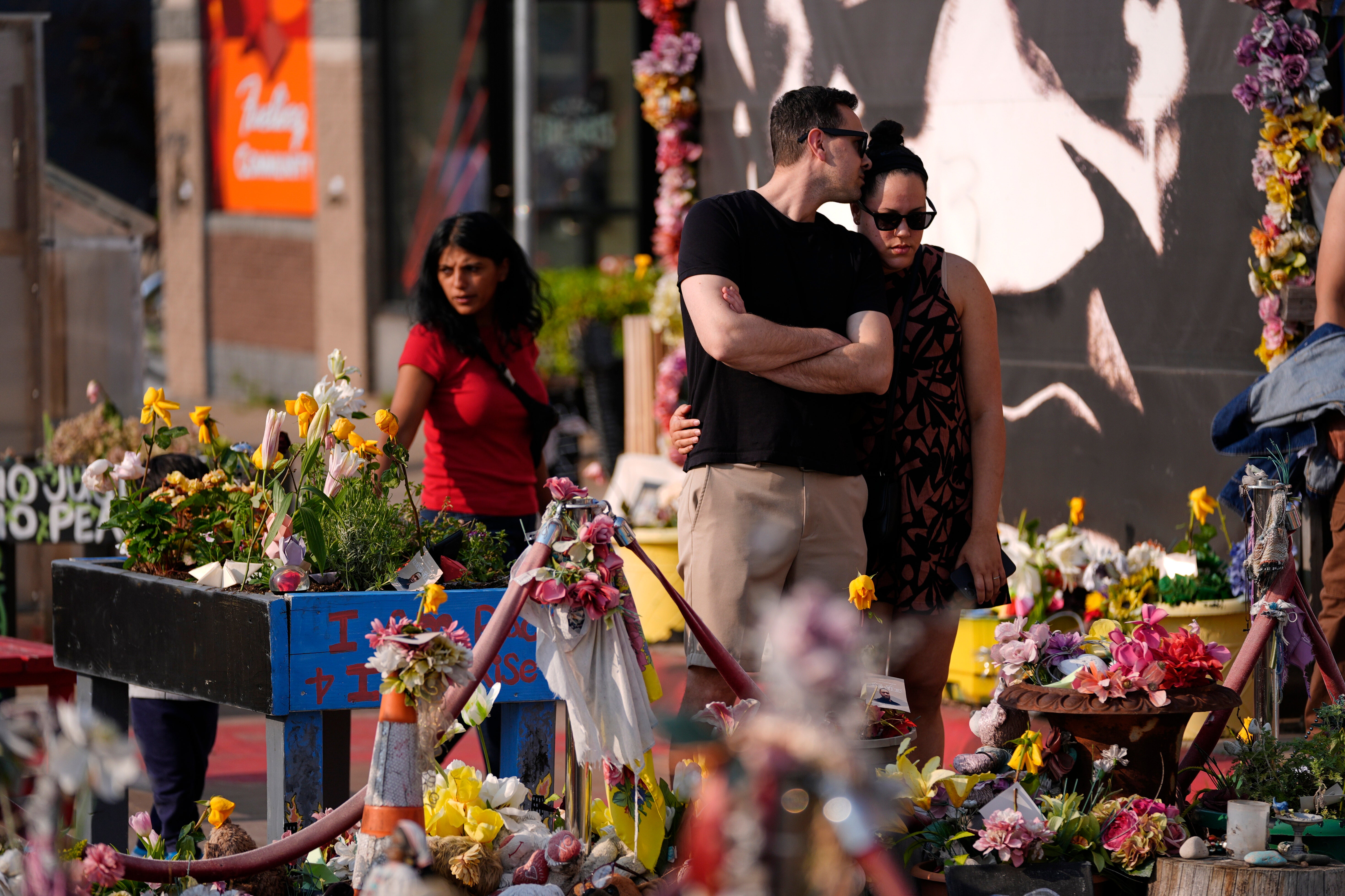 People visit George Floyd Square on the fifth anniversary of his death