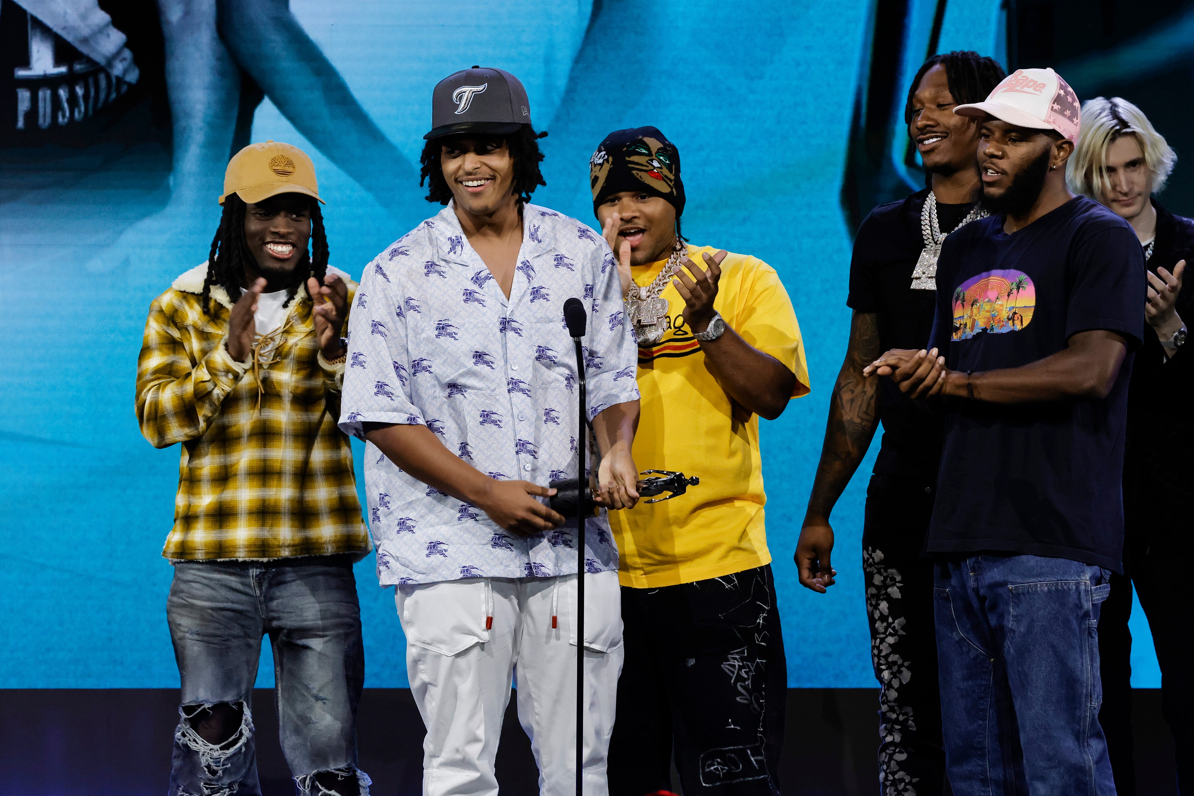 Members of AMP including Dennis (third from right) were in Texas for 30-day streaming marathon