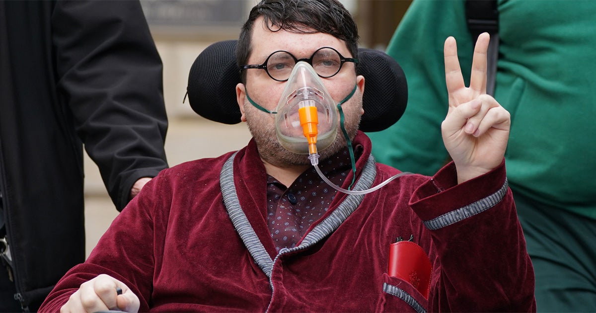Alahverdian leaves court in Edinburgh after his extradition hearing.
