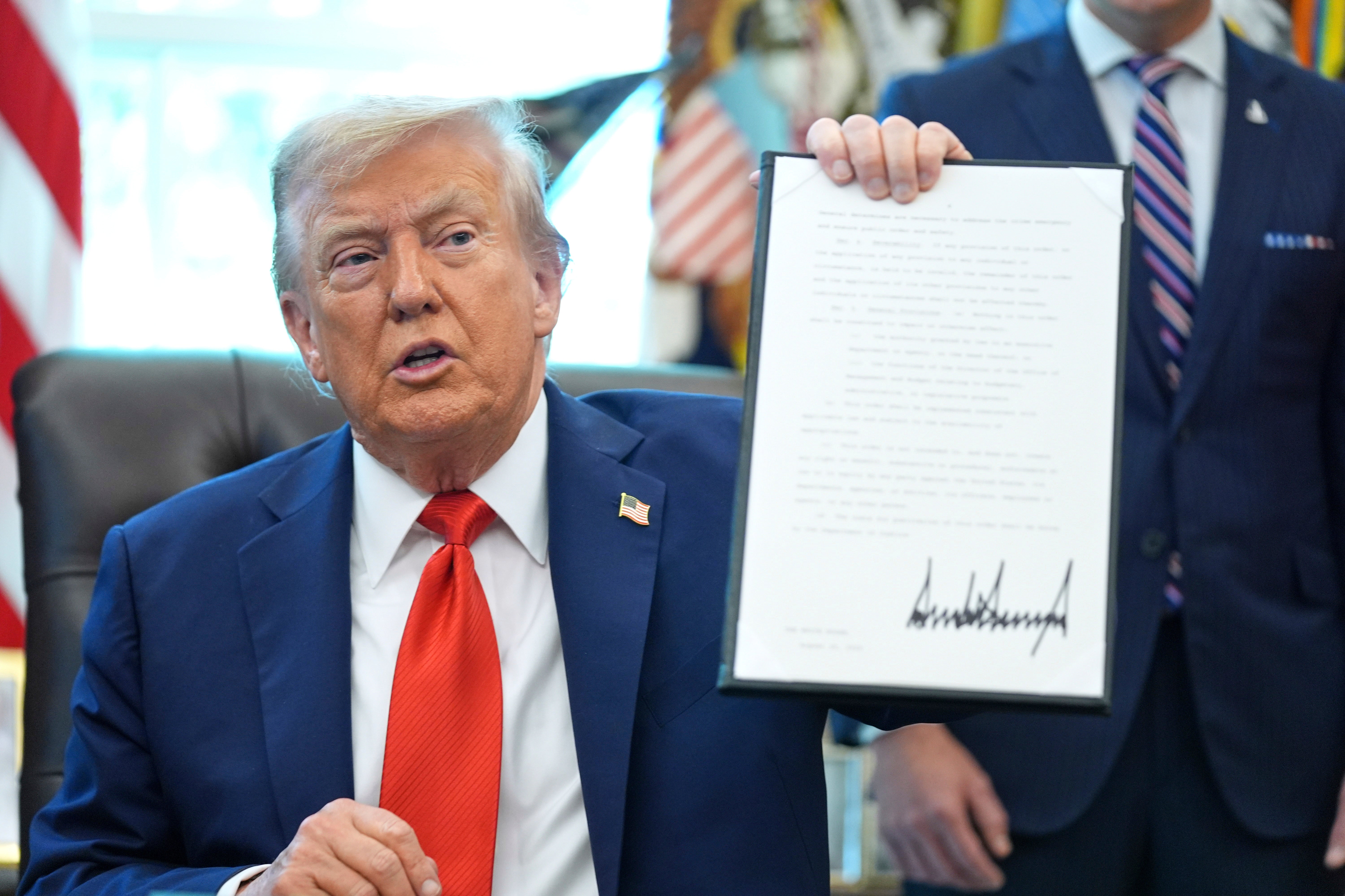 President Donald Trump signs an executive order requiring his Justice Department to ‘vigorously prosecute’ anyone who desecrates the American flag, despite Supreme Court ruling saying it’s a protected act under the First Amendment