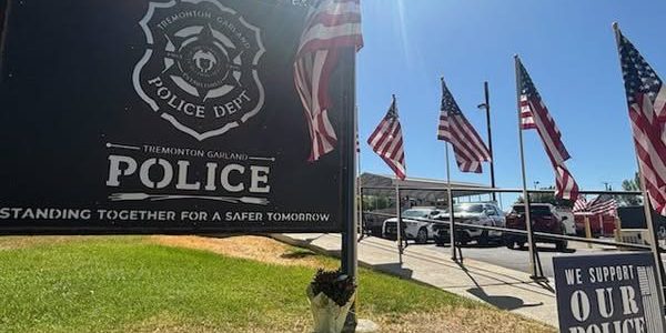 Two Officers Killed Responding to 911 Calls—Community Covers Station in Love Hours Later