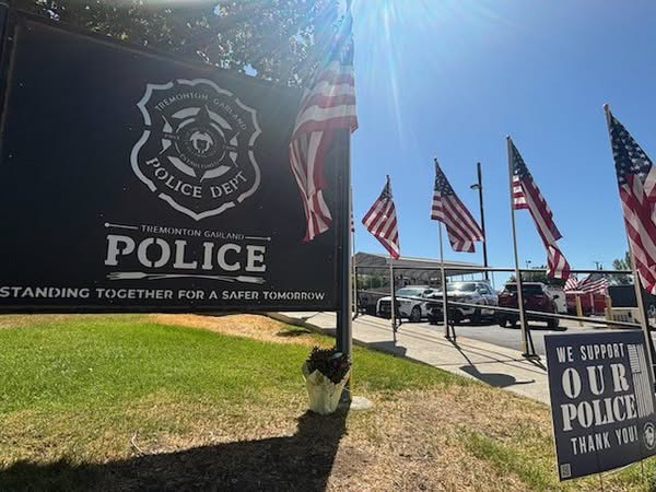 Two Officers Killed Responding to 911 Calls—Community Covers Station in Love Hours Later