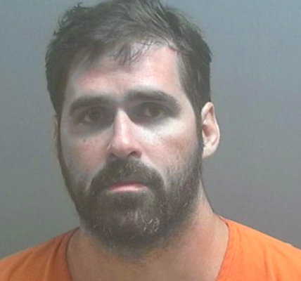 Murder suspect arrested in his underwear in woods after his ex’s new boyfriend was shot dead in car