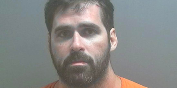 Murder suspect arrested in his underwear in woods after his ex’s new boyfriend was shot dead in car