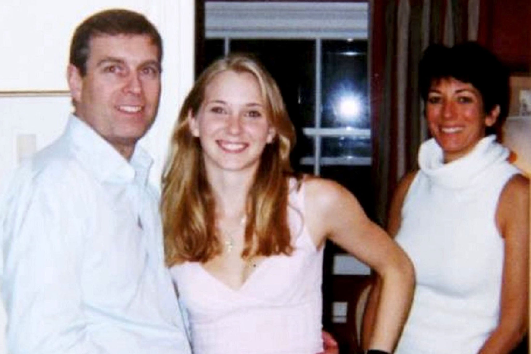 Maxwell (right), pictured with Prince Andrew (left) and Virginia Giuffre (center)