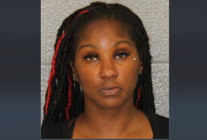 Cherez Davis, 34, of Charlotte, North Carolina, was arrested after police say she shot a gun twice into the air at a back-to-school event to break up a fight between her son and another boy