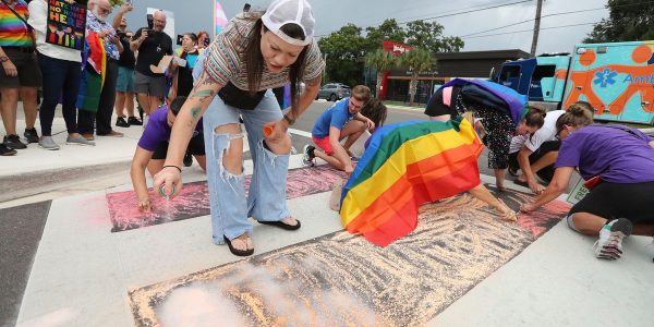 Protesters keep getting arrested and released over rainbow chalk art at the Pulse shooting memorial crosswalk