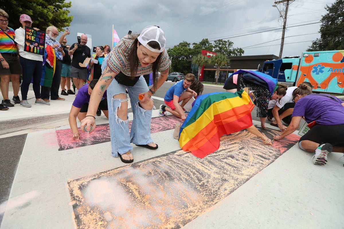 Protesters keep getting arrested and released over rainbow chalk art at the Pulse shooting memorial crosswalk