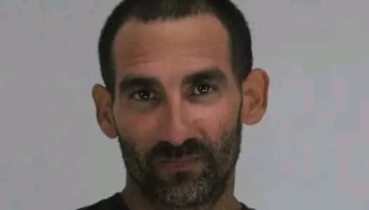 DOWNTOWN, [City] — Nagamallaiah dies in brutal machete attack at motel, police investigate suspect confession