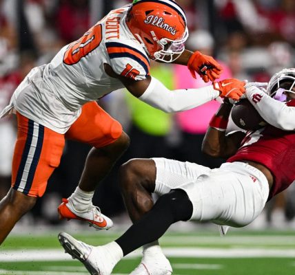 No. 19 Indiana takes control quickly and overwhelms No. 9 Illinois in 63-10 victory
