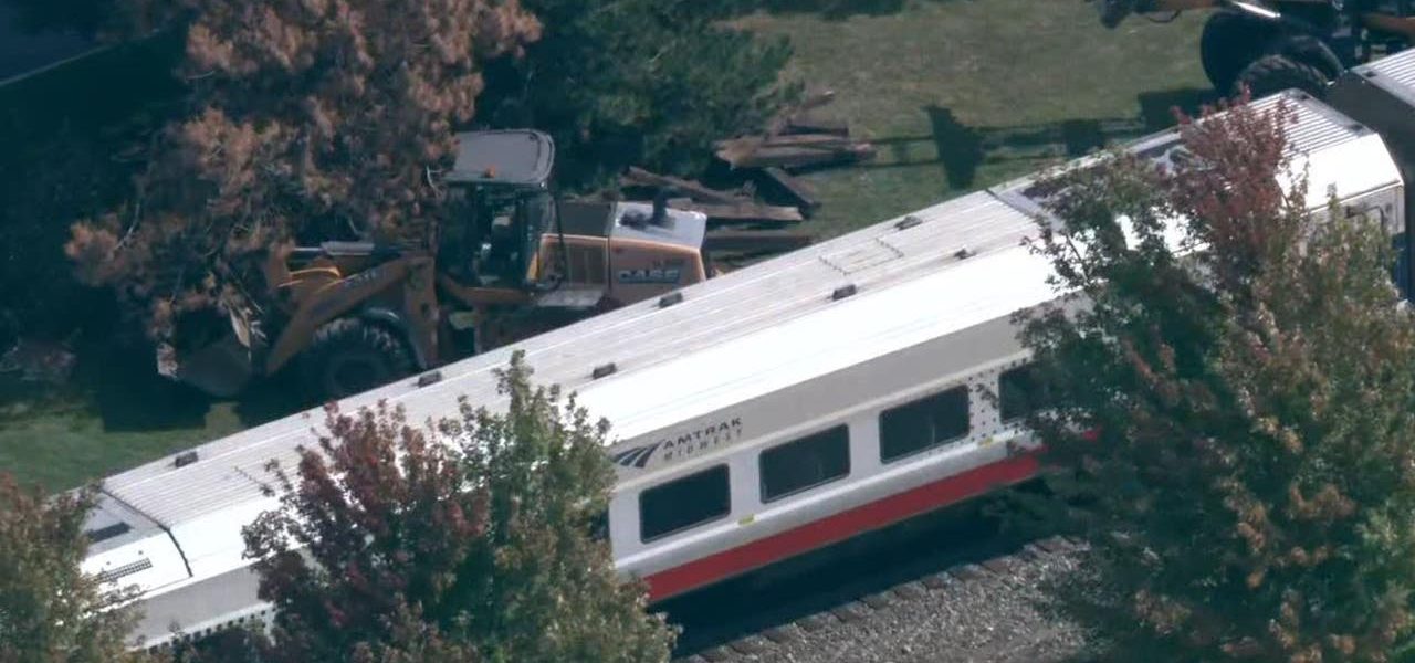 1 hurt after Amtrak train hits construction vehicle in Chicago suburbs, police say