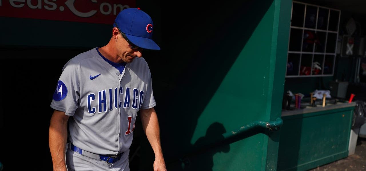 Surging Reds blank Cubs, move into tie for NL wild card spot