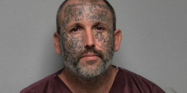 Tattoo-covered suspect accused of murdering mom and daughter served time for killing man and stuffing body in suitcase