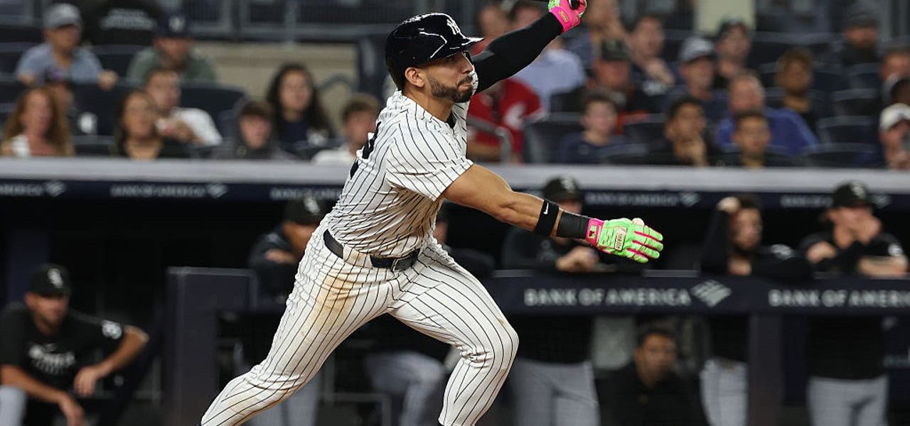 Yankees rally past White Sox 3-2, clinch playoff berth and close within 1 game of Toronto in AL East