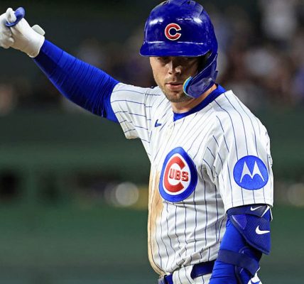 Alvarez hits 2-run homer in 8th as Mets rally to beat Cubs 9-7