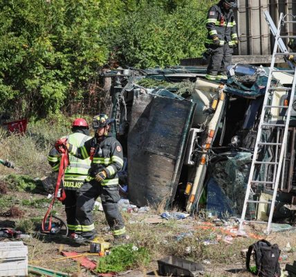 Garbage truck driver extricated after rollover crash in Unincorporated Cary