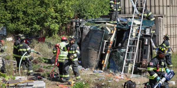 Garbage truck driver extricated after rollover crash in Unincorporated Cary
