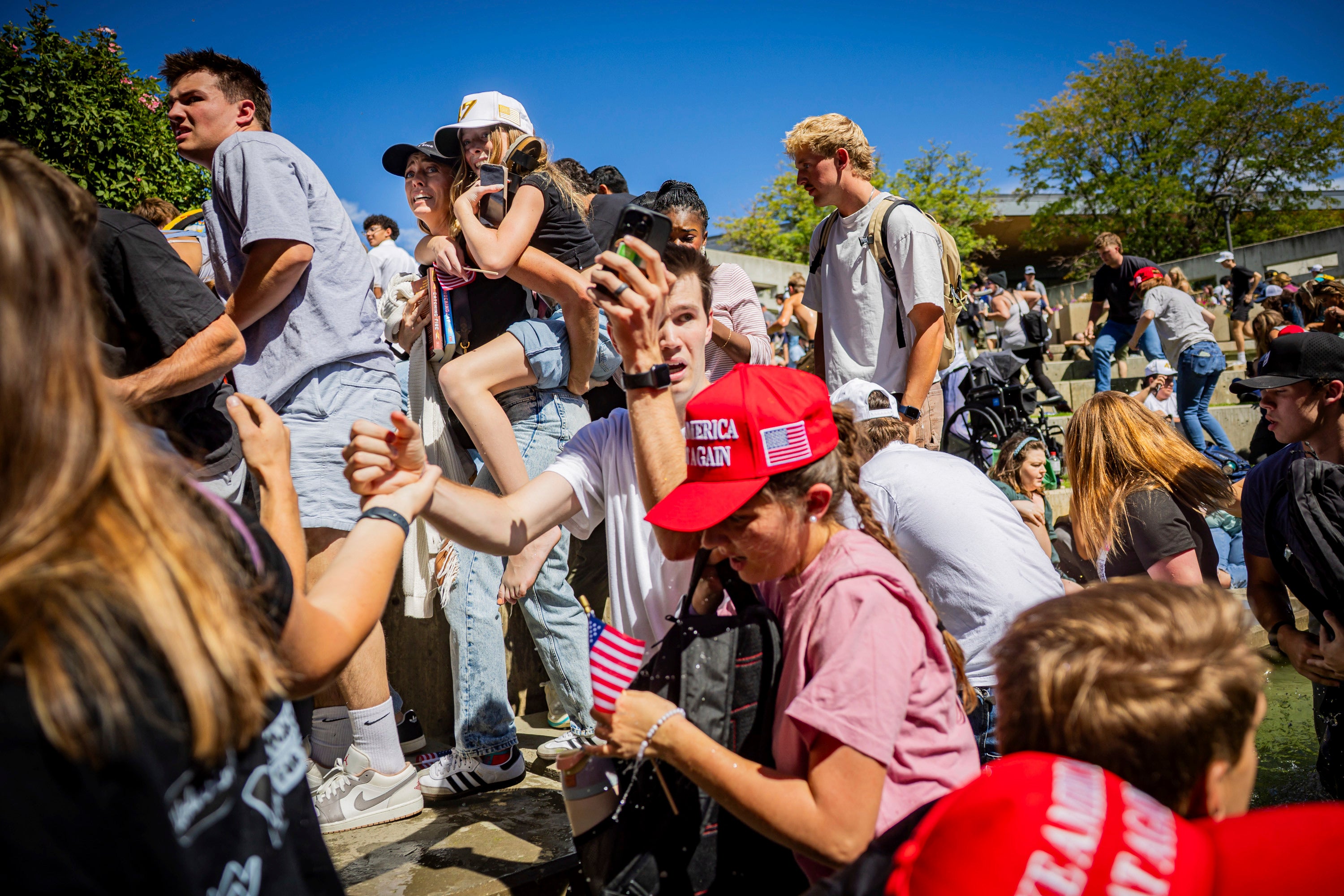 A crowd of 3,000 people scrambled after a gunman fatally shot Charlie Kirk during a speaking event at Utah Valley University September 10, sparking questions about security failures and whether there was enough protection in a large outdoor area