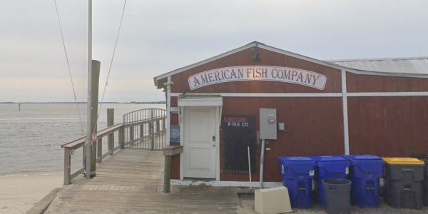 Three dead and six hurt after suspect opens fire from boat at North Carolina waterfront bar