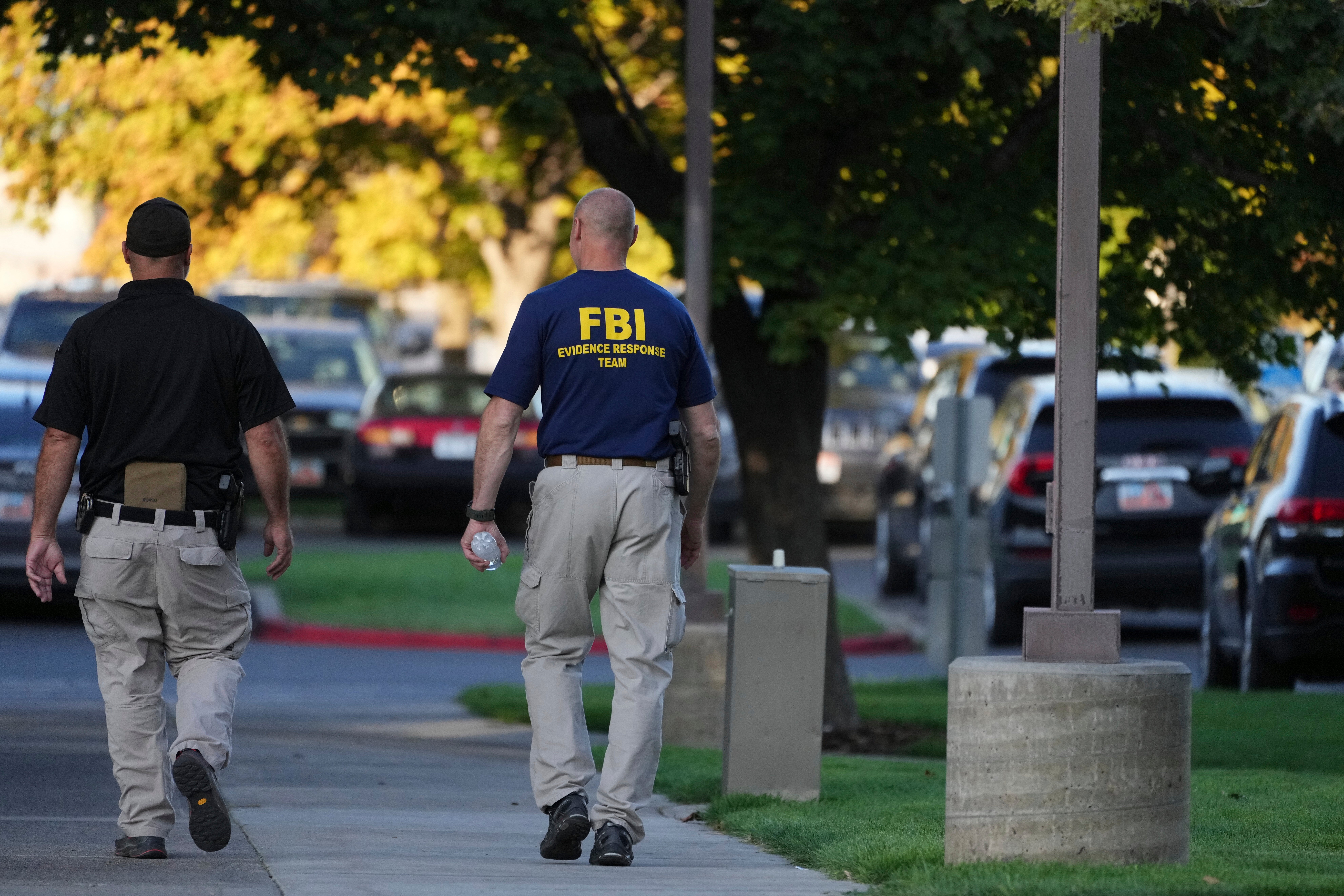 A suspect is still on the loose. The FBI has released images of a person of interest and announced a $100,000 reward leading to information leading to an arrest