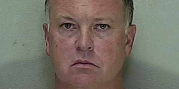 Traveling veterinarian charged after grooming a 15-year-old who worked for him, cops say