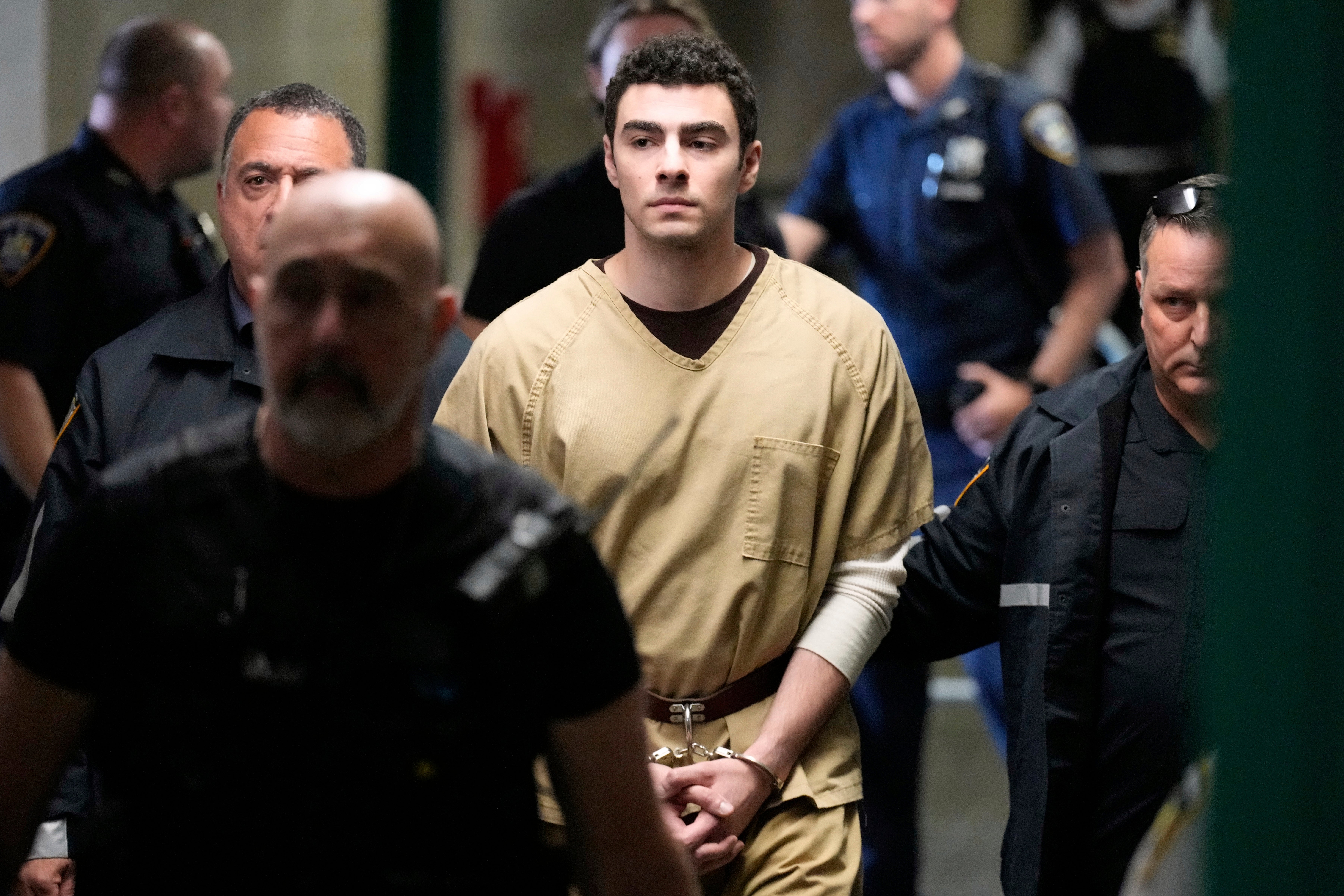Lawyers for Mangione succeeded in getting two state terrorism charges against him dropped