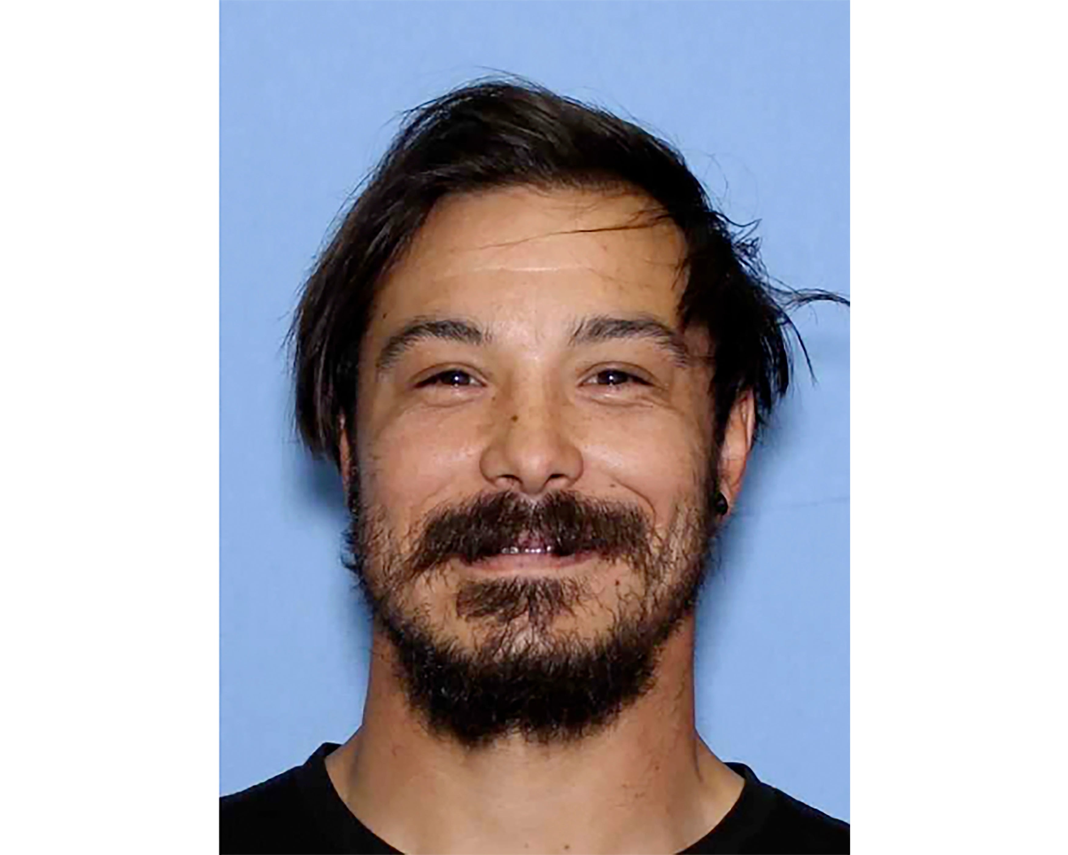 Travis Caleb Decker, who is wanted in connection with the deaths of his three daughters. (Wenatchee Police Department via AP, File)