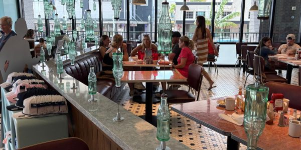 Hero waiter foils potential bloodbath after overhearing customers talk about shooting up nearby bank: police