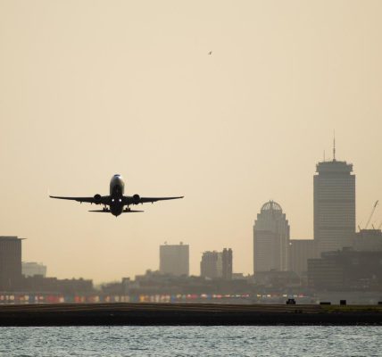 Flight diverted to Boston after passenger allegedly stabs two teens with a fork in frenzied attack, police say