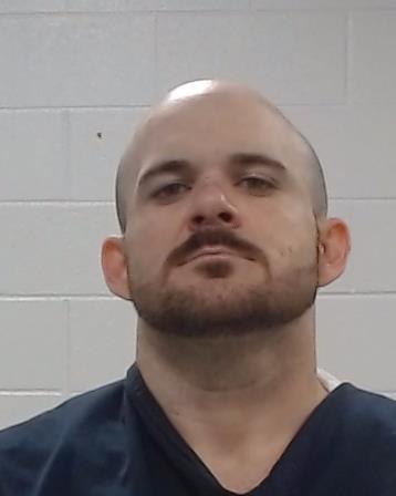 Christopher Alexander is behind bars on allegations of child abuse after police say his explanation of what happened to the child was inconsistent with the boy’s injuries