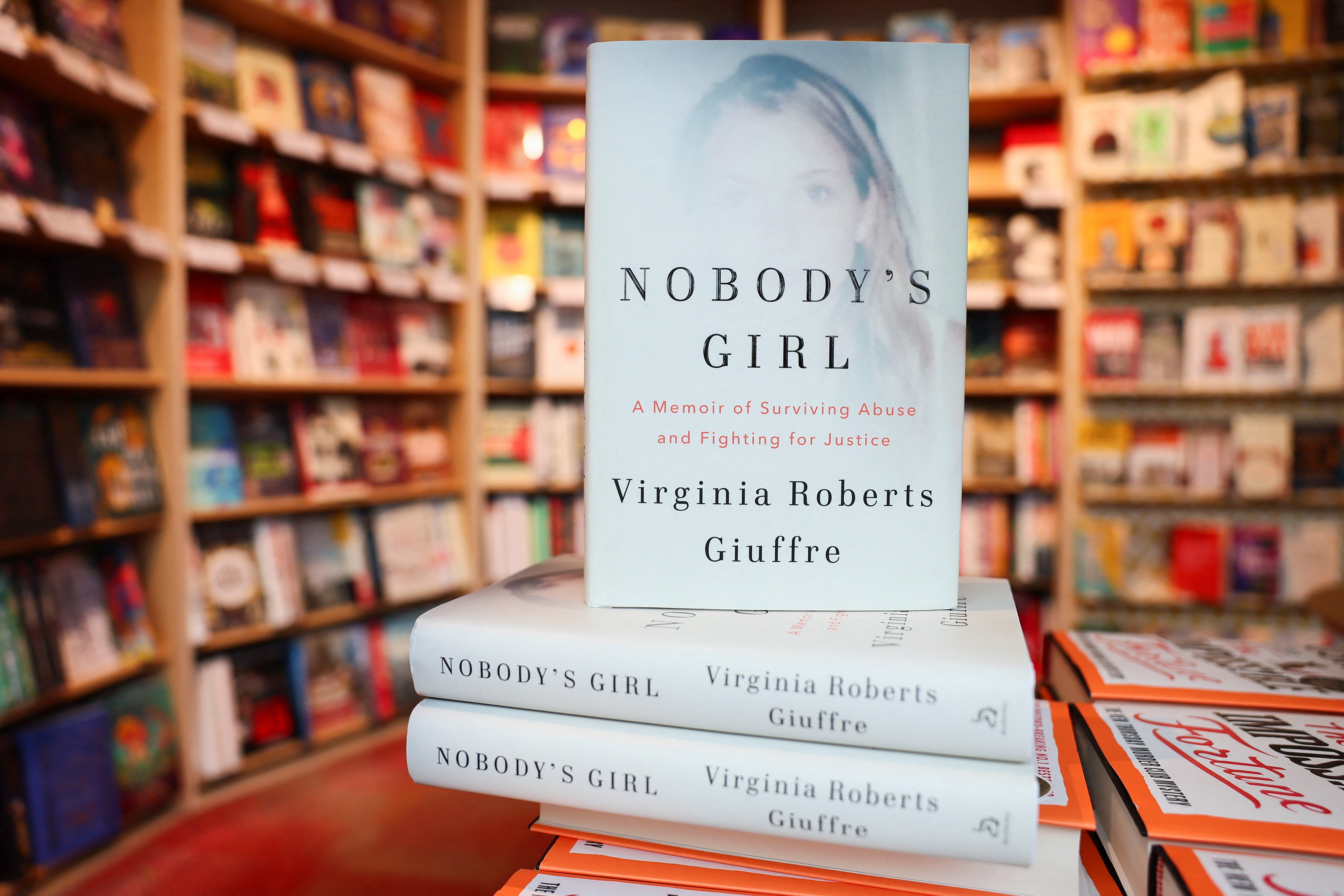 “Nobody's Girl: A Memoir of Surviving Abuse and Fighting for Justice,” is displayed at a Foyles bookshop in London