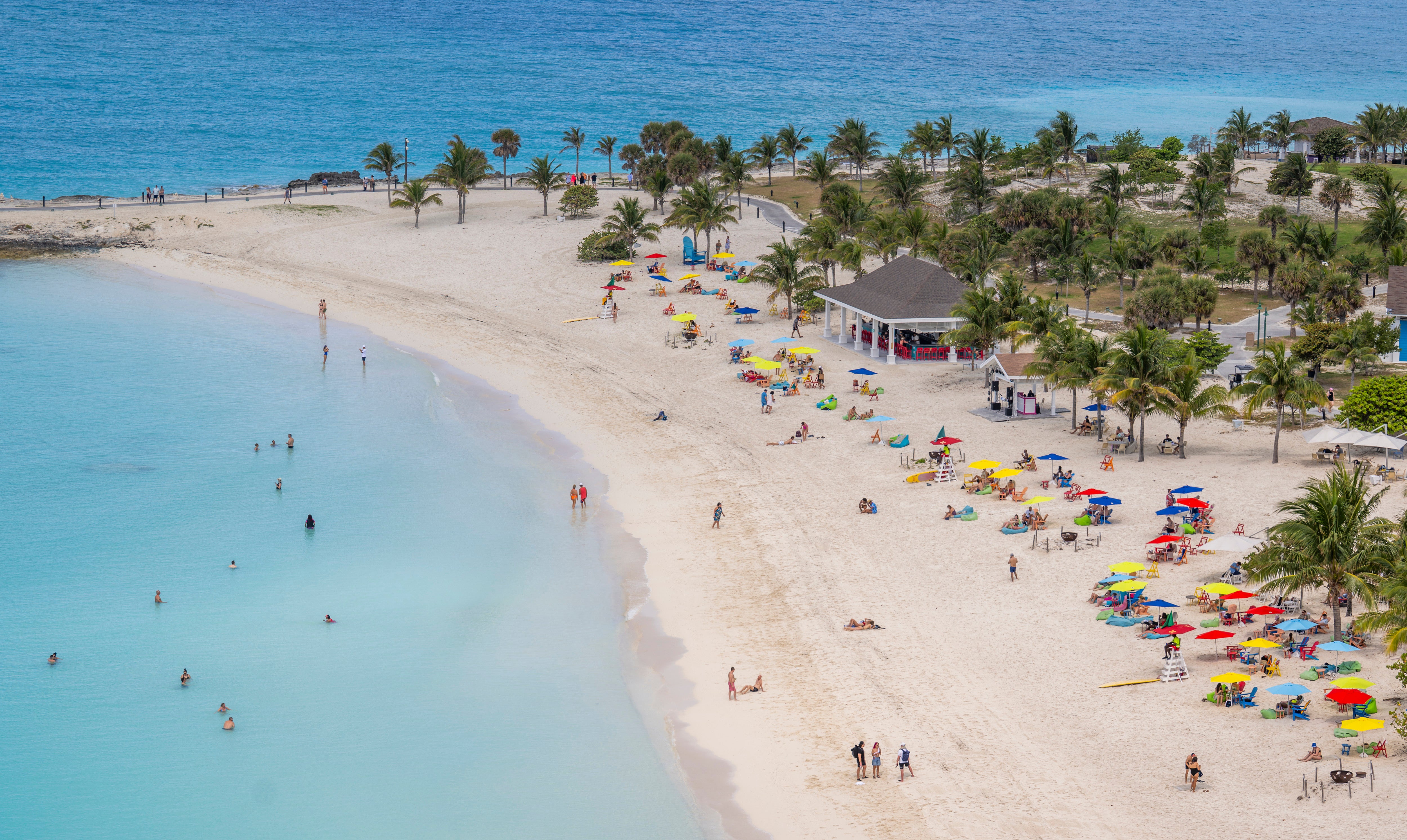 Eight Americans were among those arrested in the Bahamas after 'high-powered weapons' and cash were found on their boat, according to the authorities