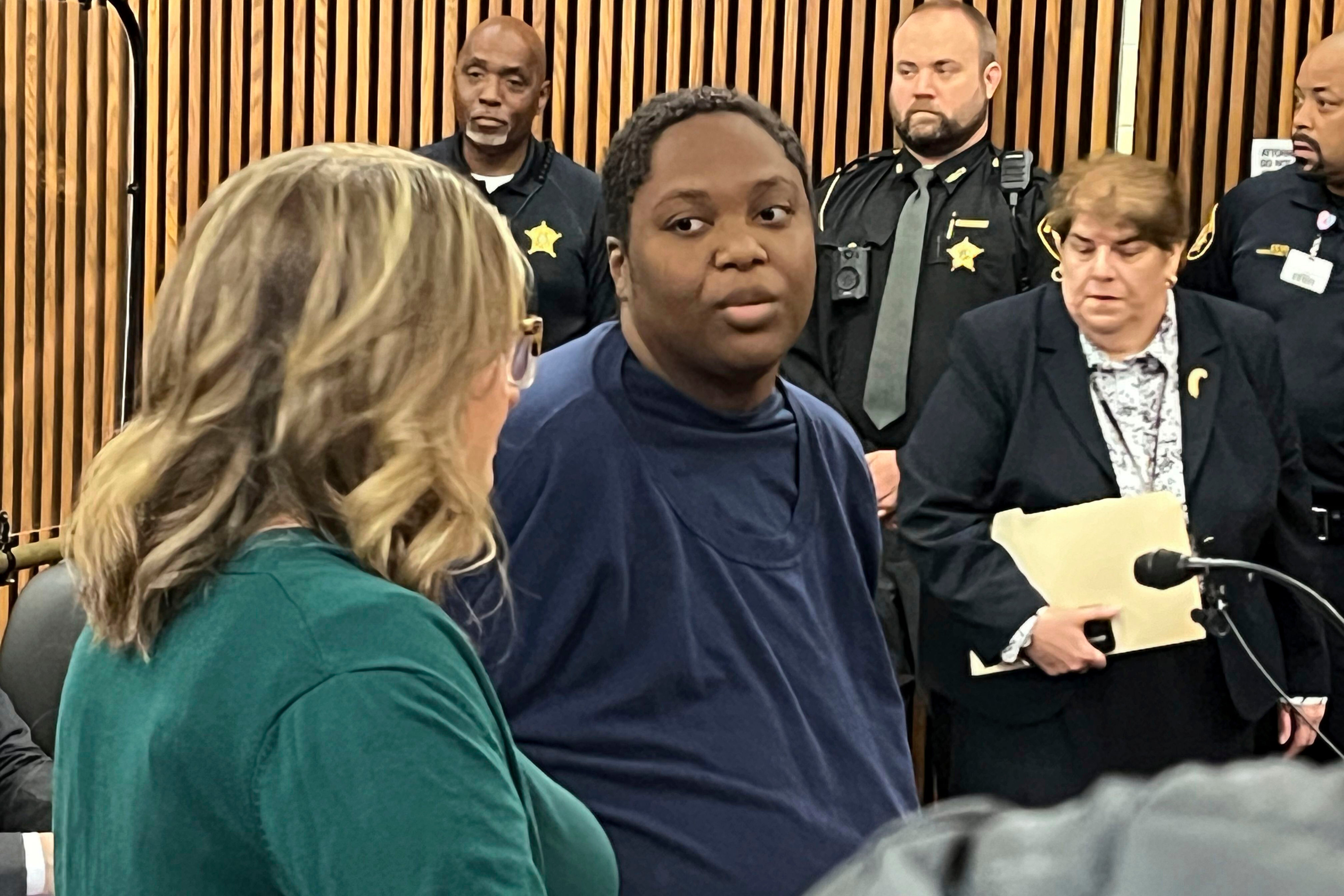 Bionca Ellis, 32, center right, appears in the Cuyahoga County Common Pleas court, June 10, 2024, in Cleveland, in the stabbing death of 3-year-old Julian Wood in a grocery store parking lot in June. (Cory Shaffer/Cleveland.com via AP, File)