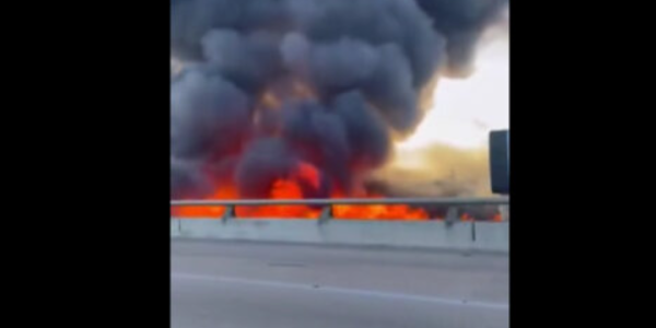 Kansas City, MO – Emergency crews are responding to a massive, multi-structure fire near East 30th Street and Cole Street, where thick plumes of smoke and towering flames have been seen rising into the night sky.