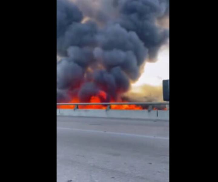 Kansas City, MO – Emergency crews are responding to a massive, multi-structure fire near East 30th Street and Cole Street, where thick plumes of smoke and towering flames have been seen rising into the night sky.