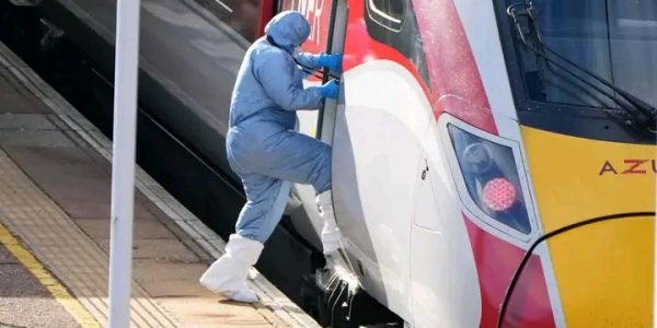 British police release details on suspects after 'shocking' train attack, update on victims