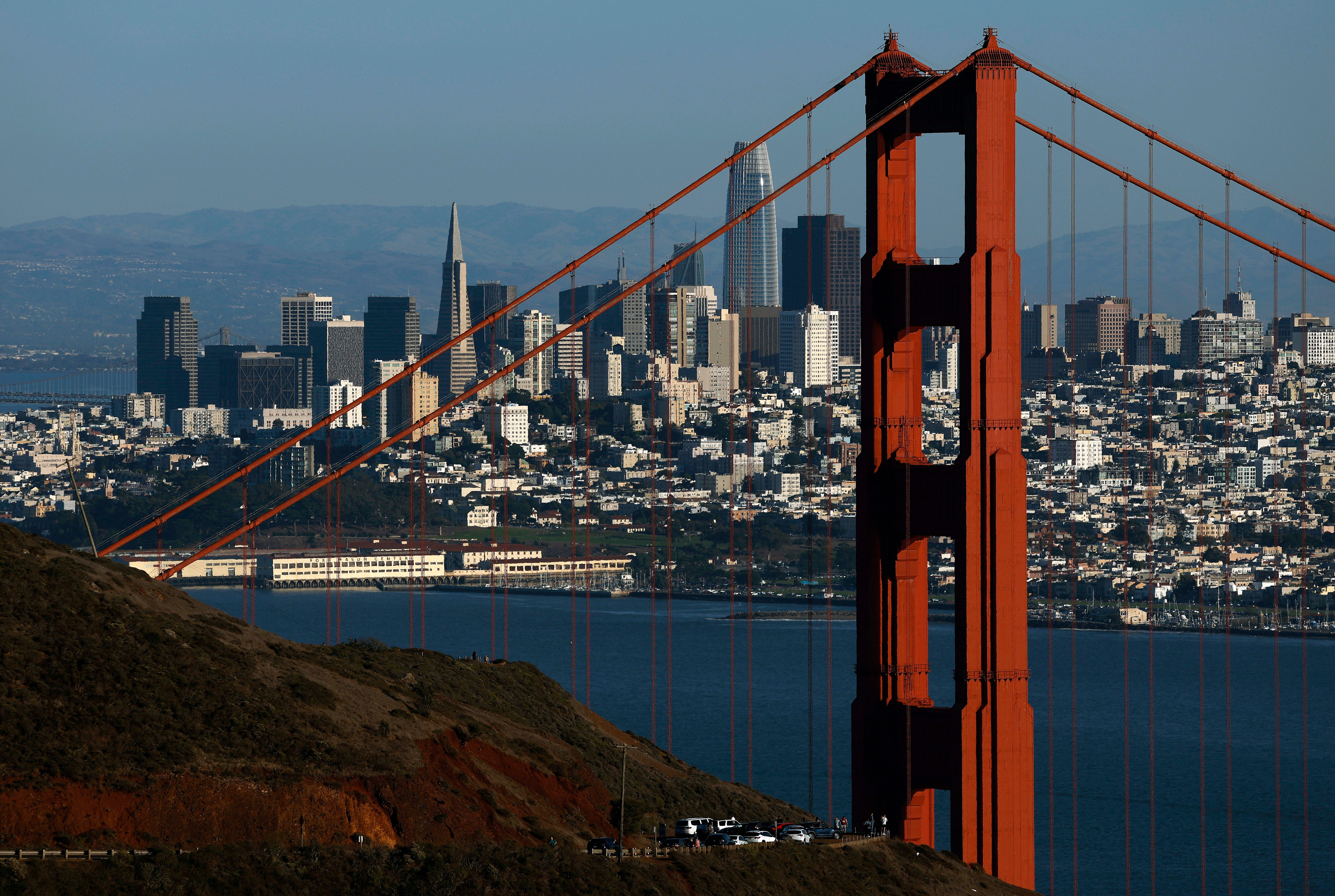 A California road rage incident turned bloody after a Tesla owner repeatedly stabbed a cyclist near the Golden Gate Bridge, the authorities said