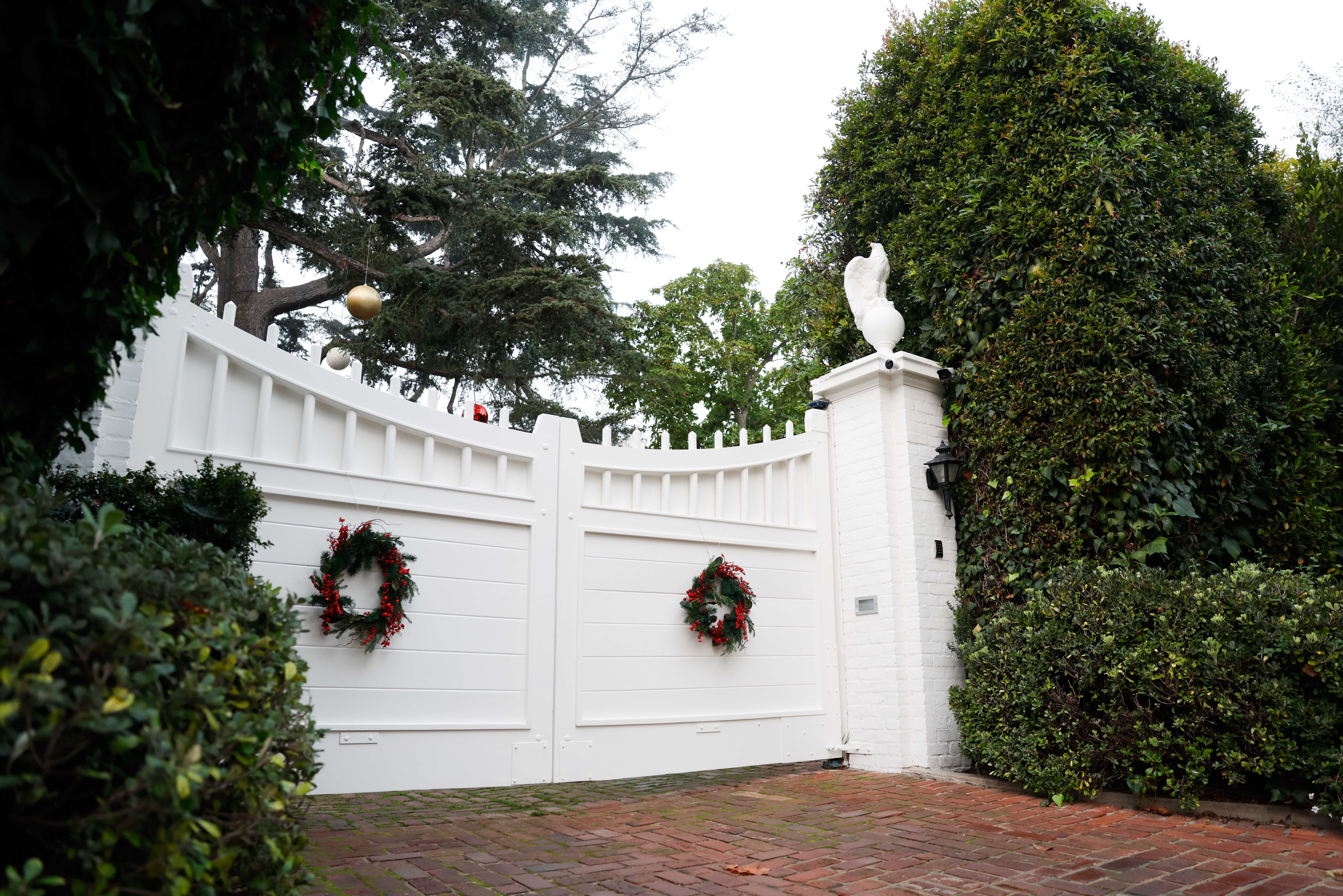 The entrance to Rob Reiner's residence is shown Monday. Officers removed police tape near the home, saying they are reopening the street