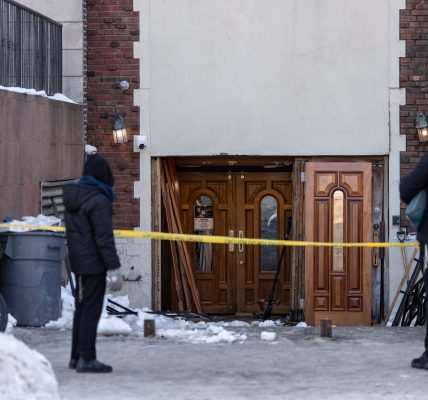 Police tape outside the Chabad headquarters after the incident