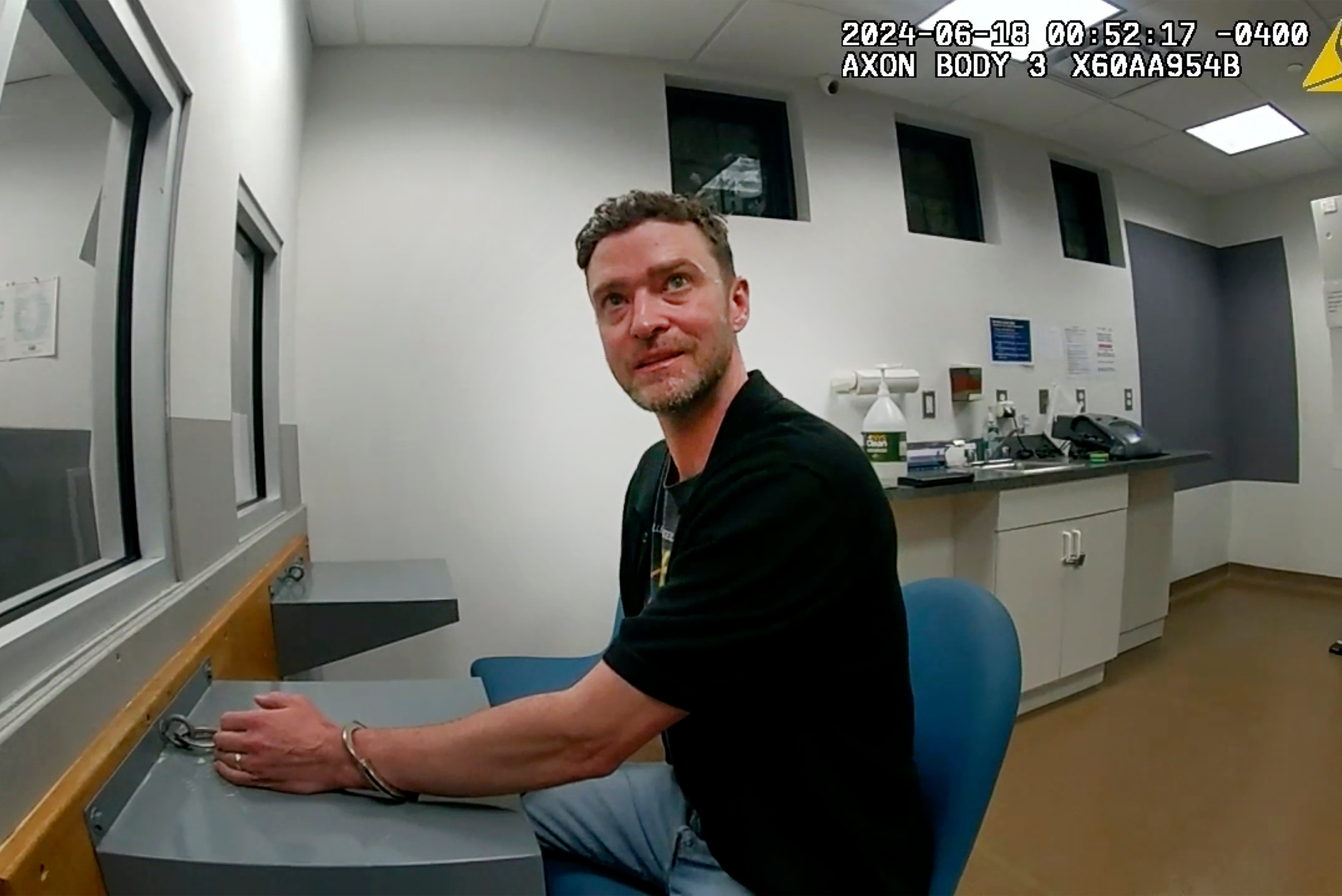 Timberlake at the police station where he is told that he will be held overnight, to which he says, “I’m going to be here all night? You guys are wild, man”